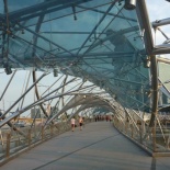 The bridge is cladded with mesh and translucent glass