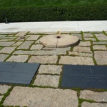 Eternal flame and marker at the grave of John F. Kennedy