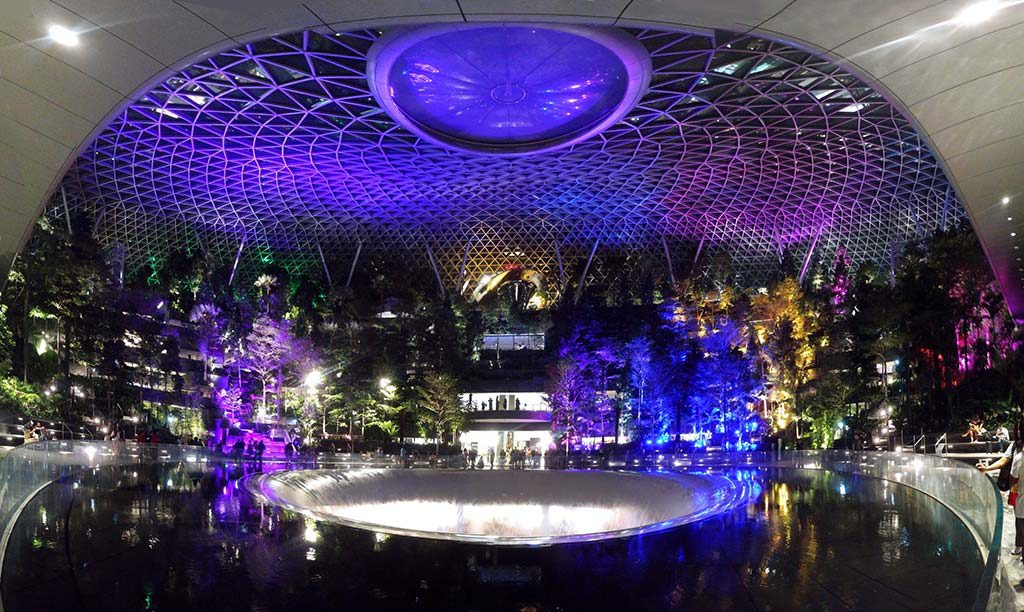 HSBC Rain Vortex waterfall central waterfall sanctuary area, with the waterfall turned off at midnight.