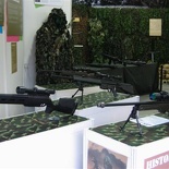 some cool lookin' sniper rifles on display.