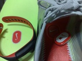 The left sole features a slot for Nike+ sports band