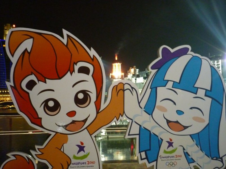 The youth olympic mascots and the flame