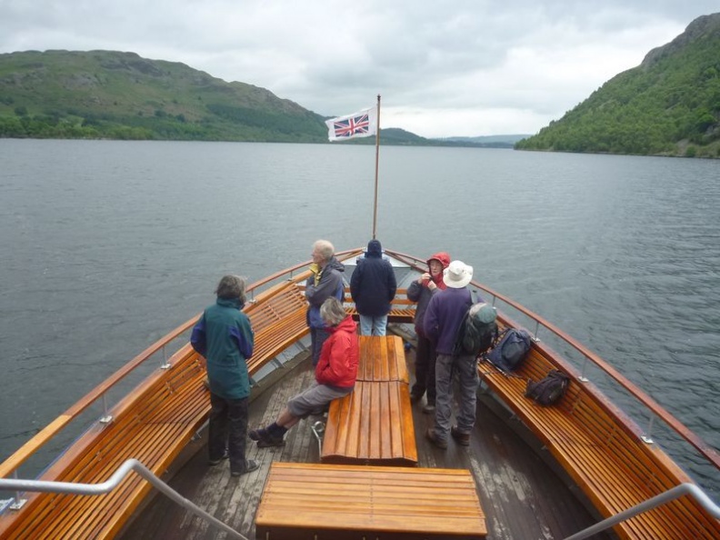 A steamer sailing through 2 mountains apart