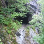 With a steep drop by the cave entrance