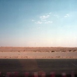 Sky, sand, road