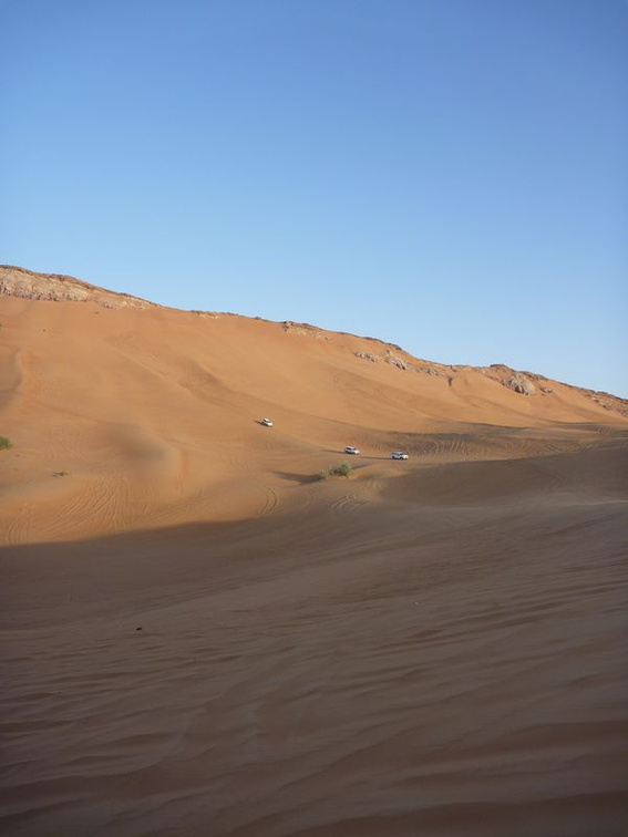 The jeeps look like ants in the distance