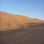 The jeeps look like ants in the distance