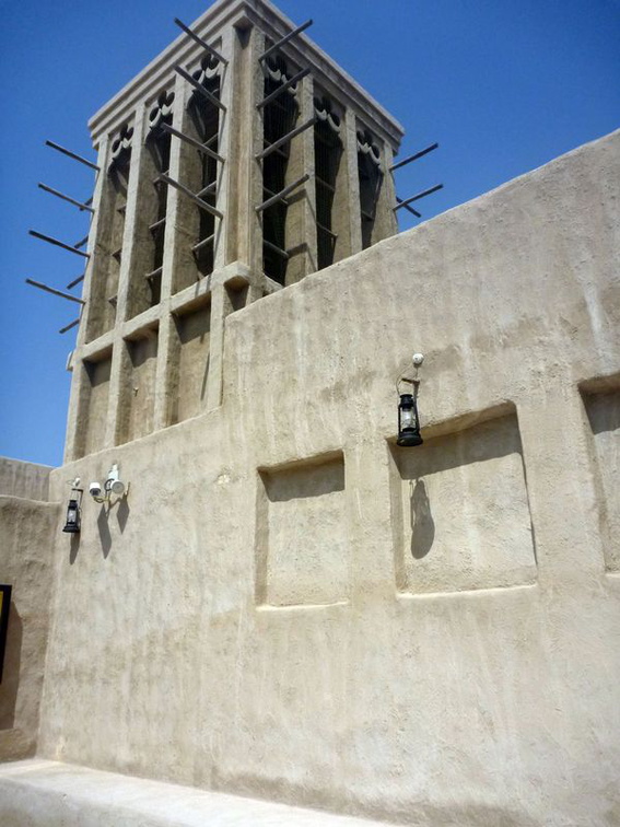 A high wall and traditiona Arbain wind towers