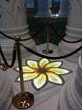 between each pillar structure sits a rather neat looking stained glass flower