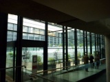 the museum has a mix of old and modern glassy architecture