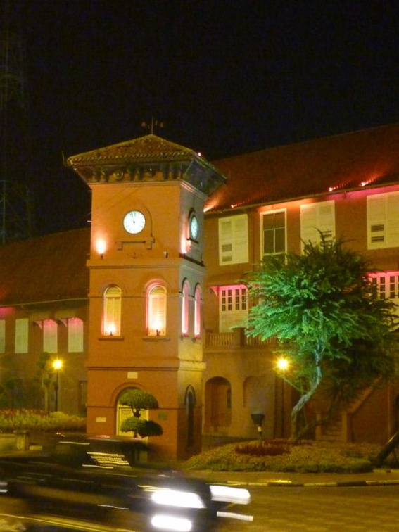 The clock tower lit at night