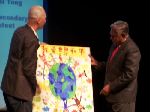 the artpiece reads &quot;I love the world peace&quot; in chinese