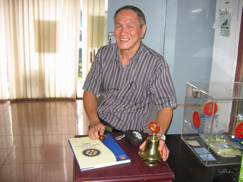 Lisa's granddad showing the rotary stand and bells