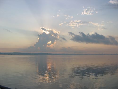 sun rays peeking through the clouds