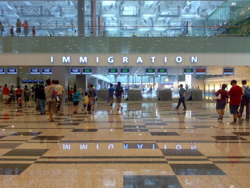 behind the counters will be the baggage collection area