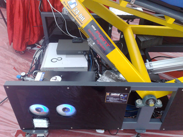 A view of the dual CPU setup (one for the game and other for processing) with the custom LED fan cooler.