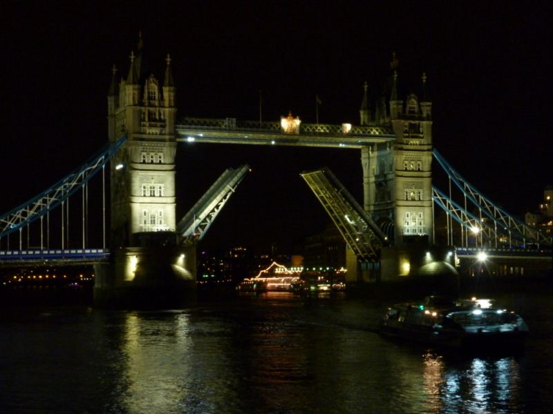 The Tower Bridge decks raising for large vessels