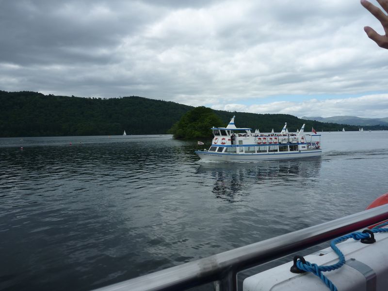 exchanging waves with another passing boat