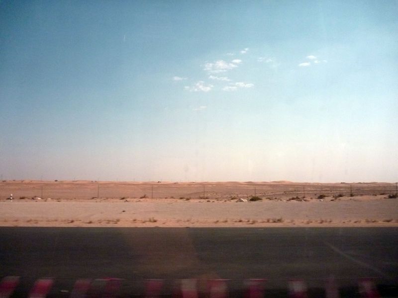 Sky, sand, road