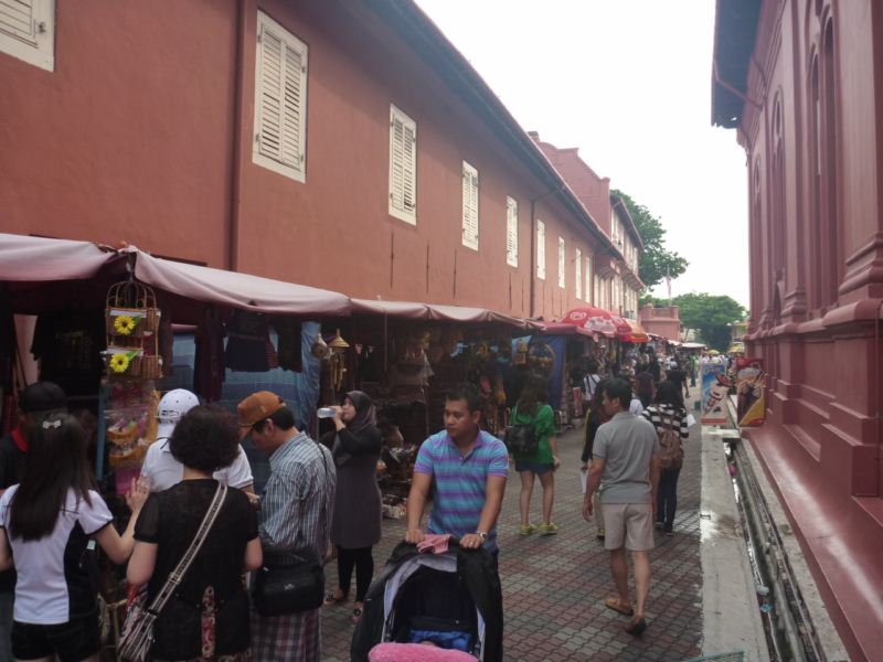 the shops run alongside the church