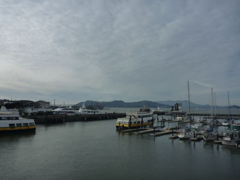 a clear day with the golden gate bridge in the far left