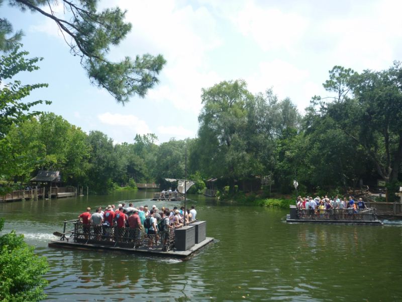 people on a barge! on a river!