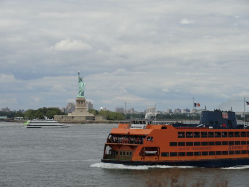 The ferry runs right pass the statue