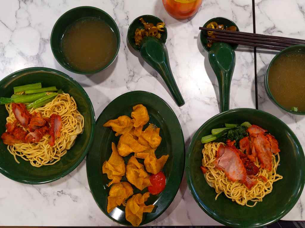 Eng Wantan Mee Dry and steam wanton mee with their trademarked char siew and fried wanton sides