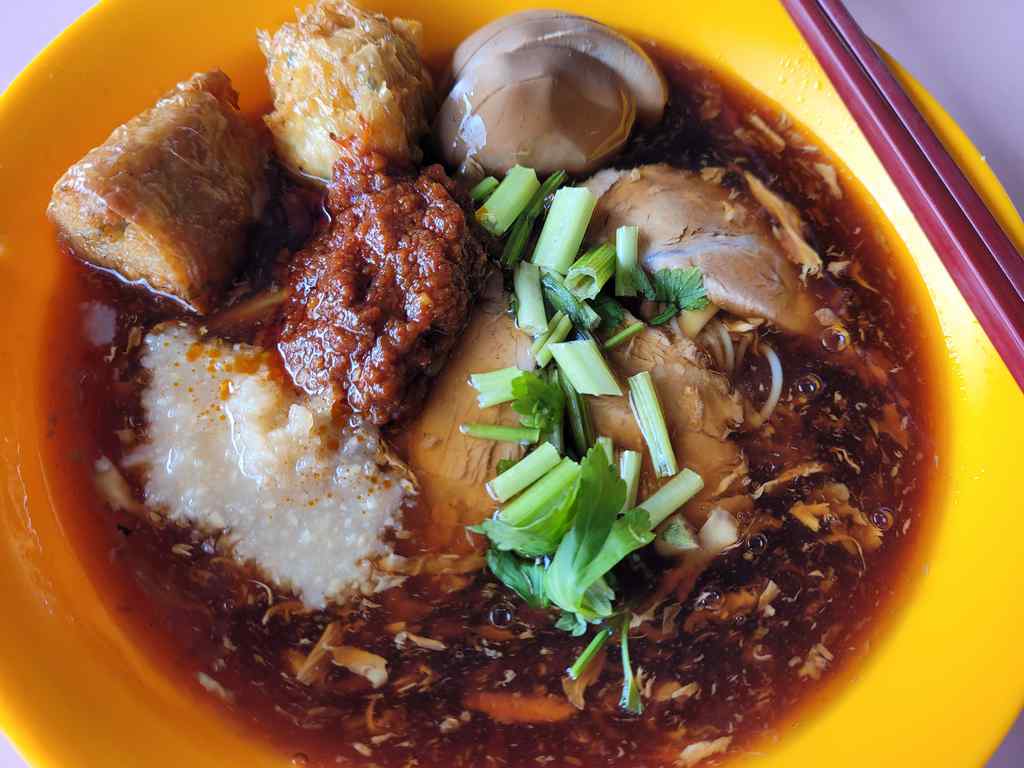 Your Loh Mee dish, with the noodles buried under a reasonably generous serving of condiments.