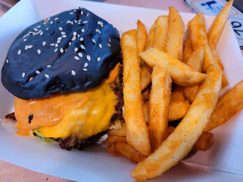 Ashes Burnnit Burgers Ashes Smash Cheese Burger. Comprising of hand-crafted beef patty, american cheese, topped with fried shallots, lettuce & Ashes signature sauce