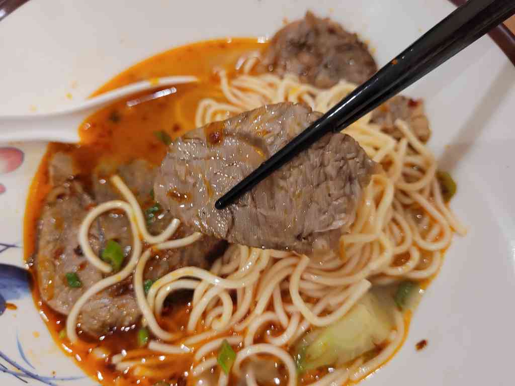 Ramen with beef, available in spicy and non spicy variants $9