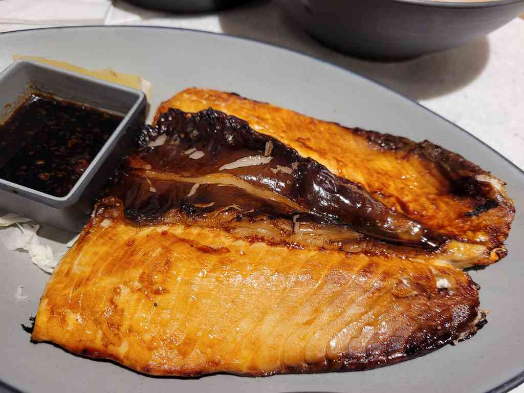An alternative to soupy steamed fish is their large grilled fish similar to familiar Saba grilled fish